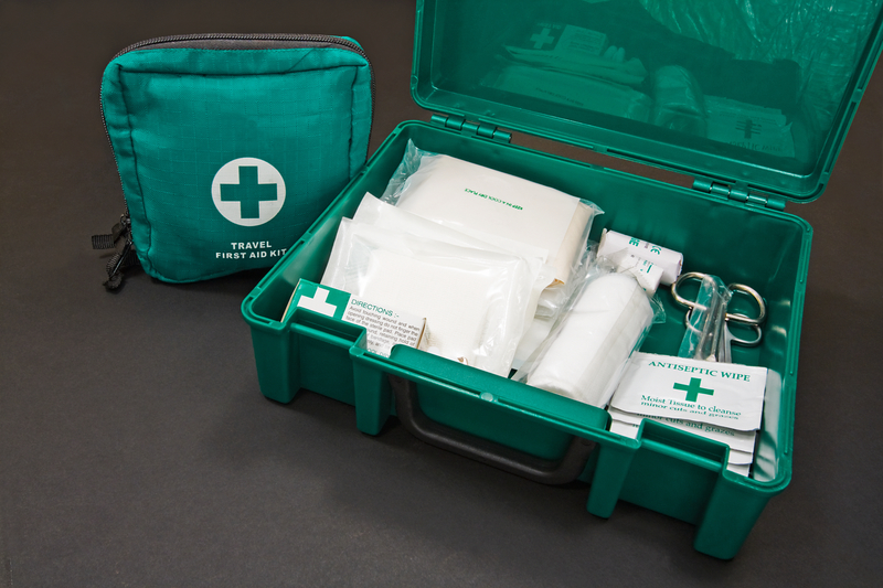 A green standard First aid kit